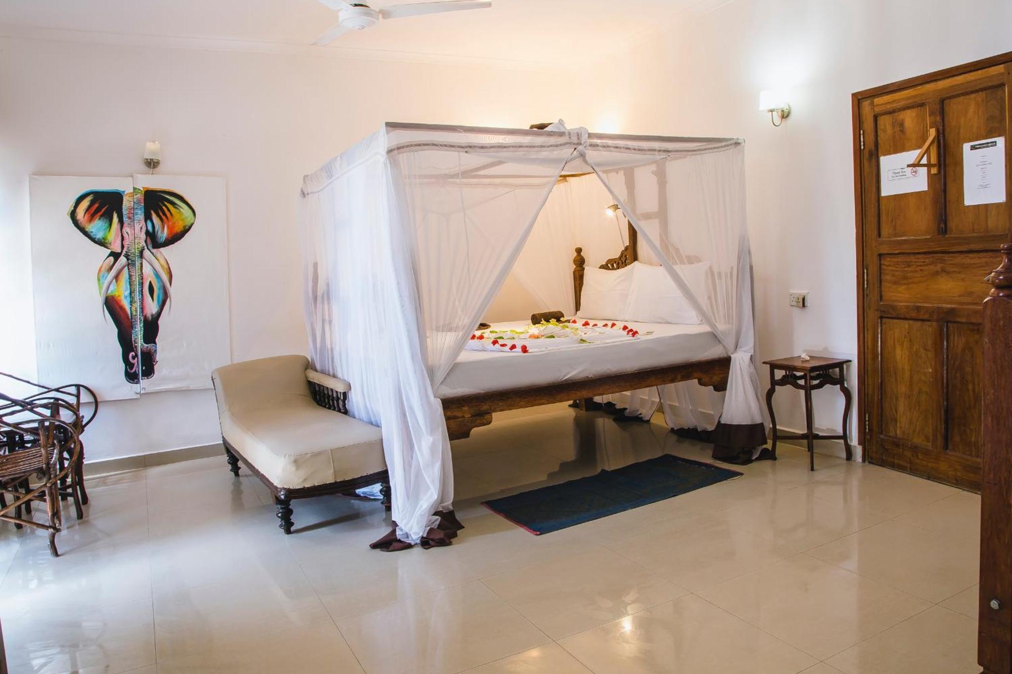 Moonshine Uroa Boutique Hotel Chambre photo