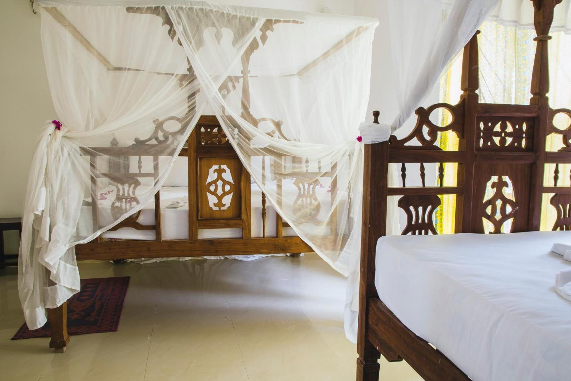 Moonshine Uroa Boutique Hotel Chambre photo