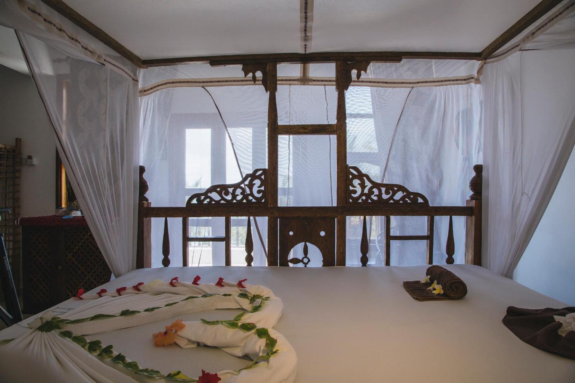 Moonshine Uroa Boutique Hotel Chambre photo